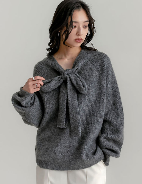 片畔ニットネックリボントップス