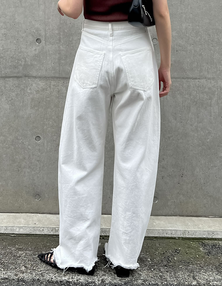 裾フリンジカーブデニムパンツ