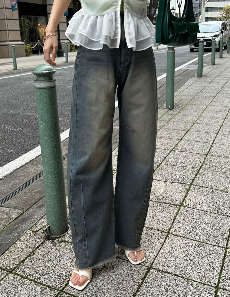 裾フリンジカーブデニムパンツ