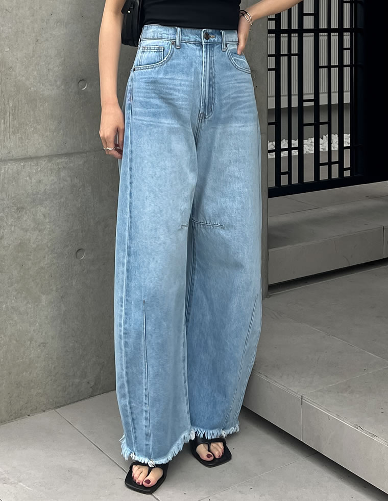 裾フリンジカーブデニムパンツ