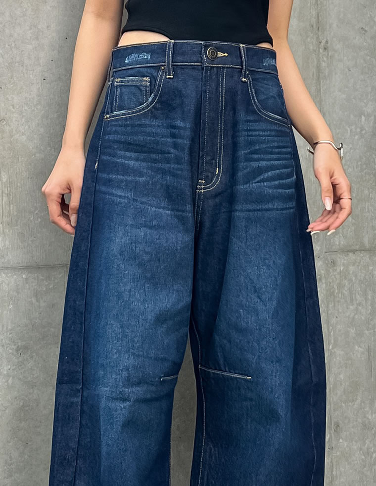 裾フリンジカーブデニムパンツ