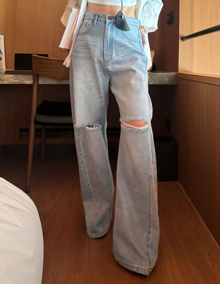 裾フリンジカーブデニムパンツ