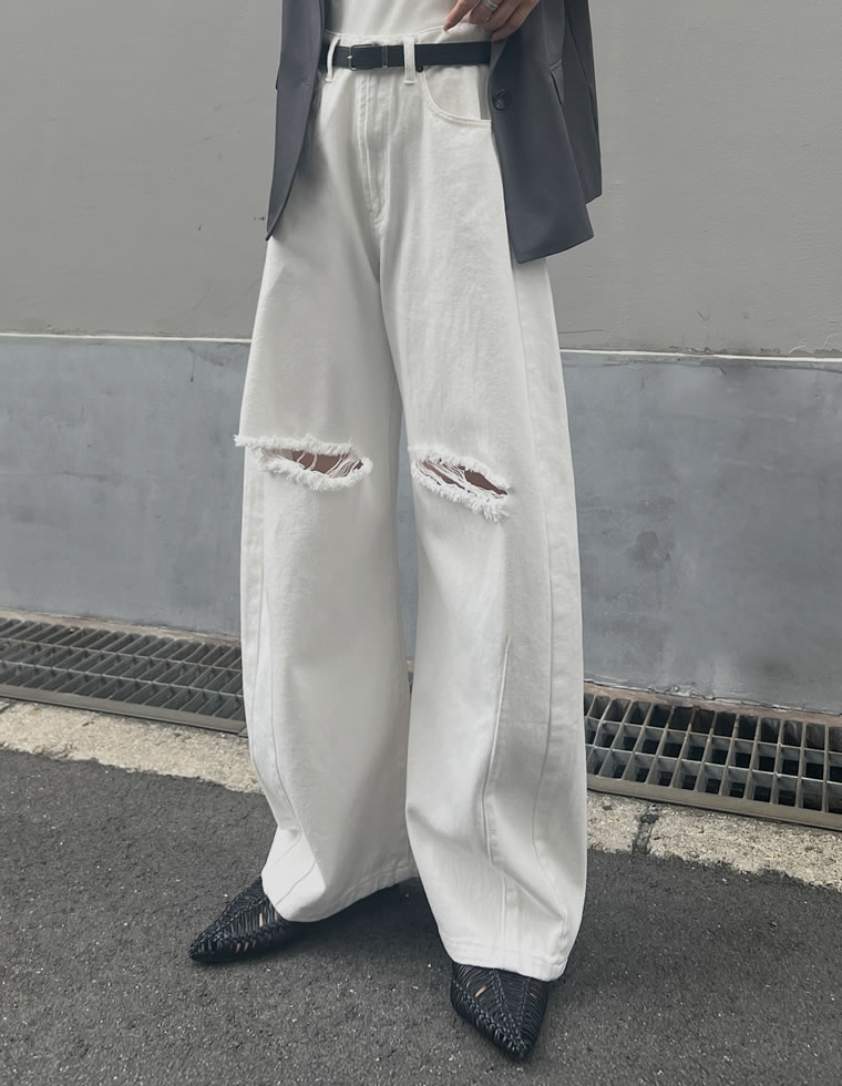 裾フリンジカーブデニムパンツ