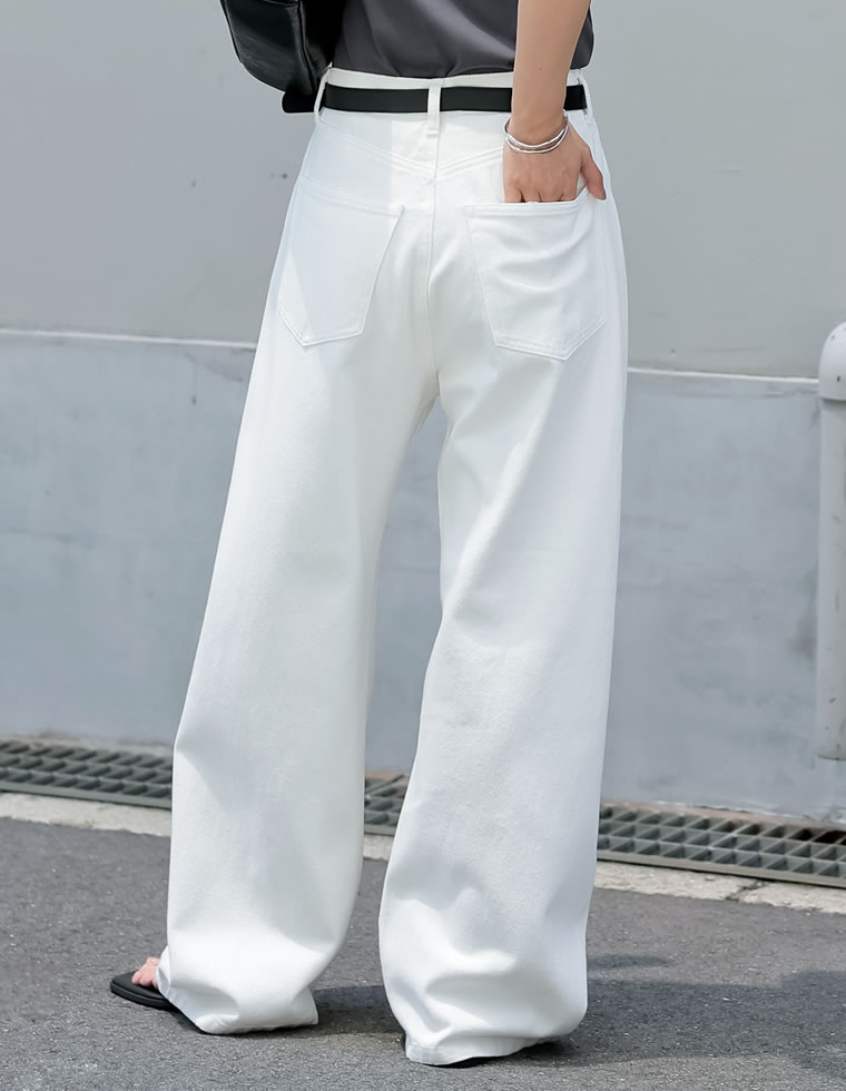 裾フリンジカーブデニムパンツ