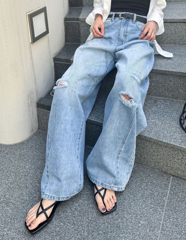 裾フリンジカーブデニムパンツ