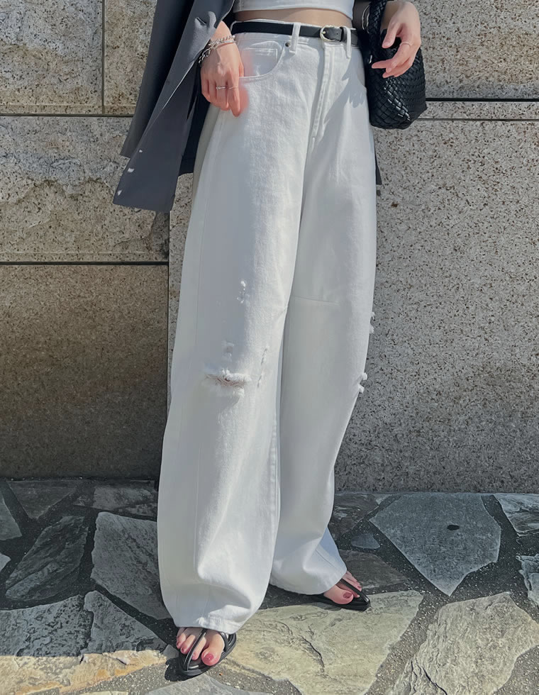 裾フリンジカーブデニムパンツ