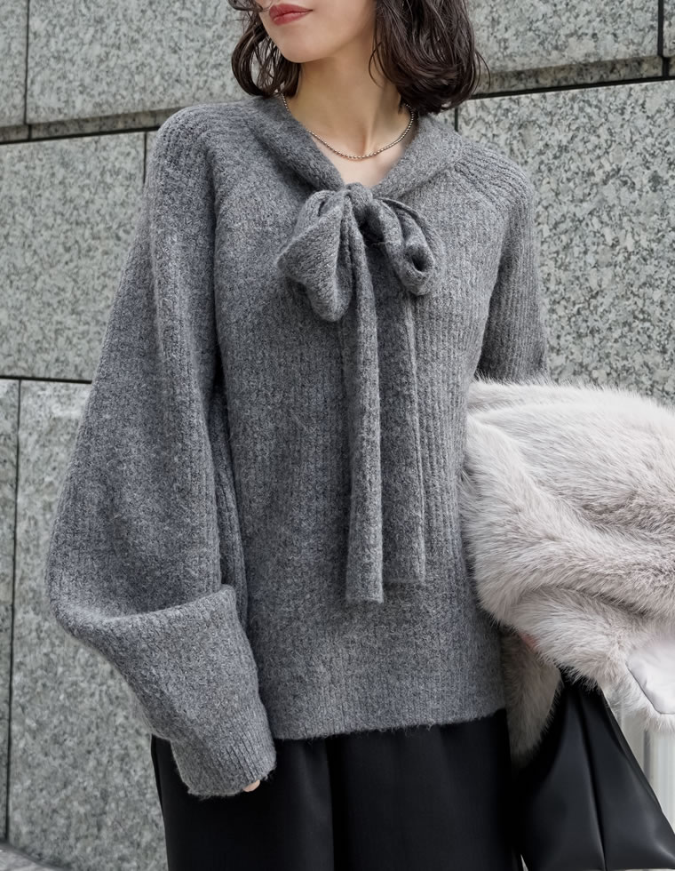片畔ニットネックリボントップス